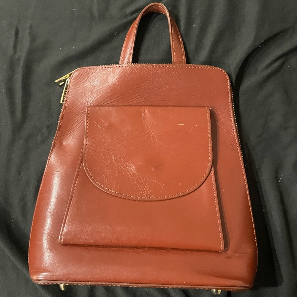 Genuine vintage leather backpack. Italian designer Anna Luchini